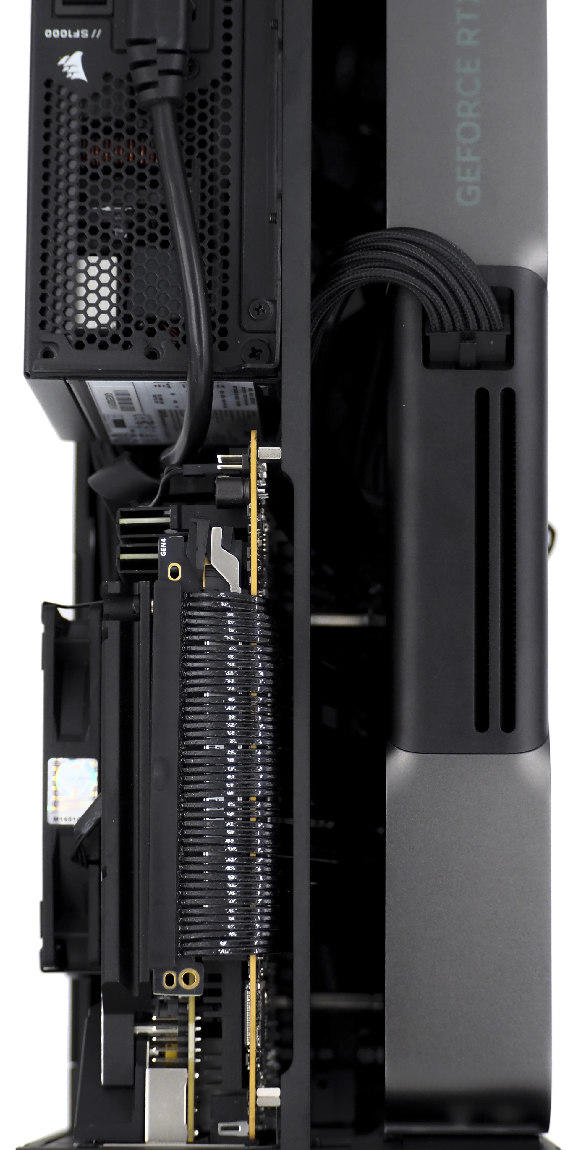 The internal cooling channel: heatsink fins between the power supply and the graphics card